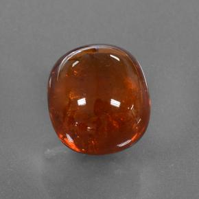 Grenat spessartite orange naturelle coupe ovale, 4,09 ct, translucide