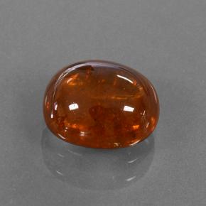 Grenat spessartite orange naturelle coupe ovale, 4,09 ct, translucide