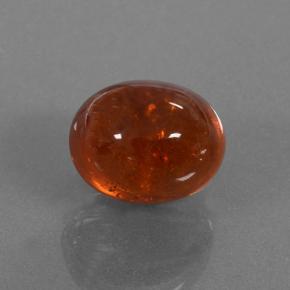 Grenat spessartite orange naturelle coupe ovale, 4,16 ct, translucide