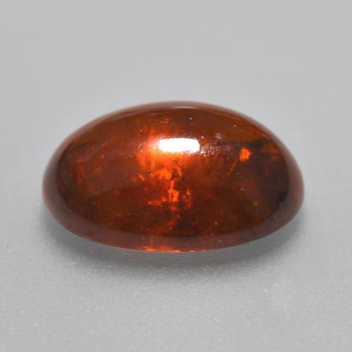 Grenat spessartite orange naturelle coupe ovale, 5,72 ct, translucide