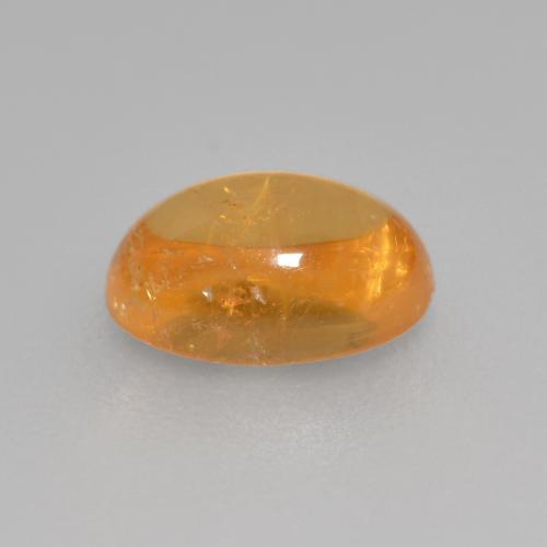 Grenat Spessartite Orange-or naturelle Coupe ovale, 0.82 ct, Transparent