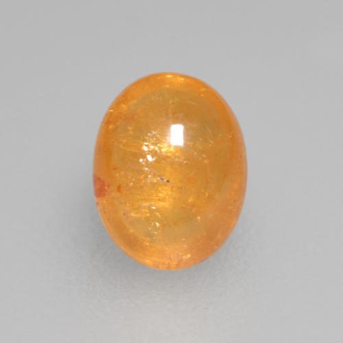 Grenat spessartite orange miel naturelle coupe ovale, 0,56 ct, transparent