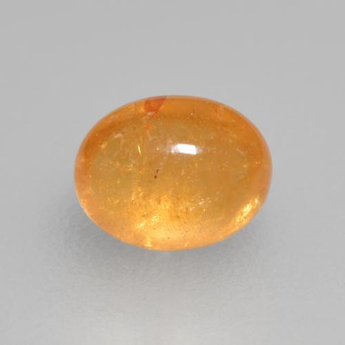 Grenat spessartite orange miel naturelle coupe ovale, 0,56 ct, transparent
