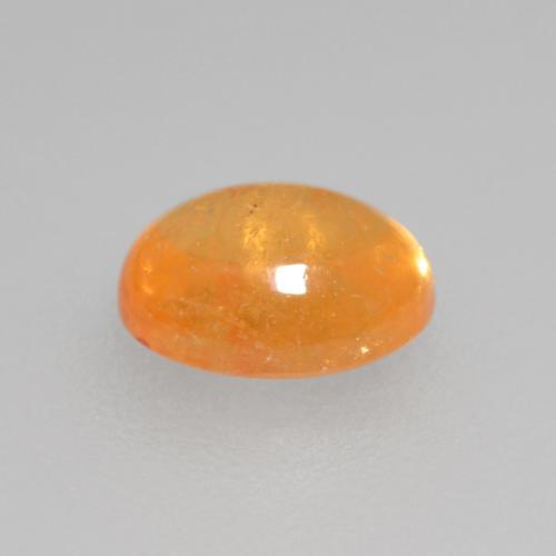 Grenat spessartite orange miel naturelle coupe ovale, 0,56 ct, transparent