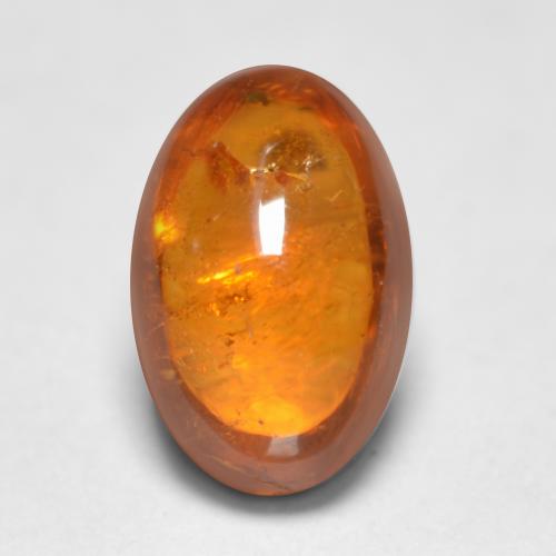 Grenat spessartite orange naturelle coupe ovale, 0,81 ct, transparent