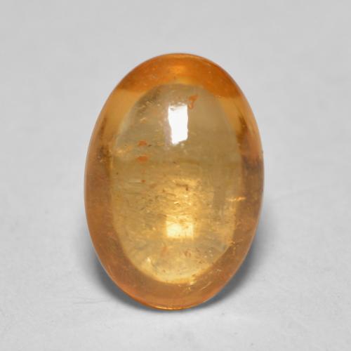 Grenat spessartite orange naturelle coupe ovale, 0,82 ct, transparent