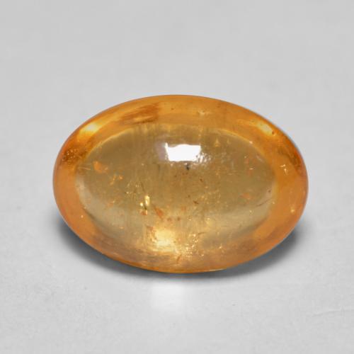 Grenat spessartite orange naturelle coupe ovale, 0,82 ct, transparent