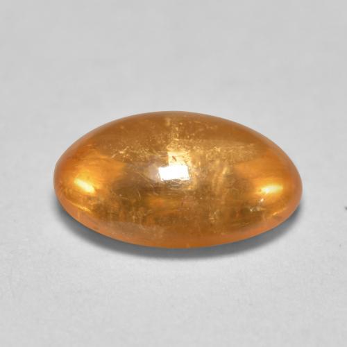 Grenat spessartite orange naturelle coupe ovale, 0,82 ct, transparent