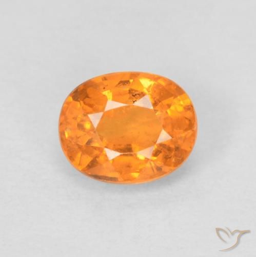 Grenat Spessartite Orange vif naturelle ovale, 0.58 ct, VS