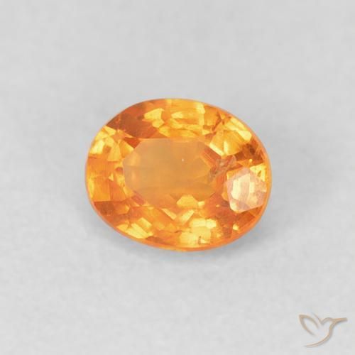 Grenat Spessartite Orange vif naturelle ovale, 0.53 ct, VS