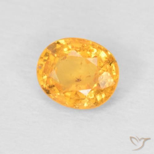 Grenat Spessartite Doré-orange foncé naturelle ovale, 0.52 ct, VS