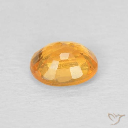 Grenat Spessartite Doré-orange foncé naturelle ovale, 0.52 ct, VS