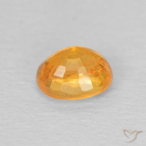Grenat Spessartite Doré-orange foncé naturelle ovale, 0.58 ct, VS
