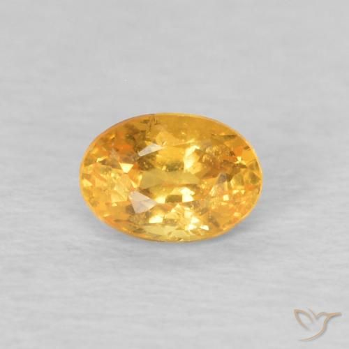 Grenat Spessartite Doré vif naturelle ovale, 0.22 ct, VS