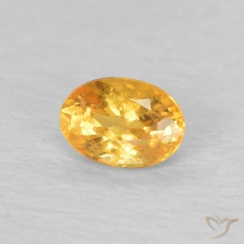Grenat Spessartite Doré vif naturelle ovale, 0.22 ct, VS