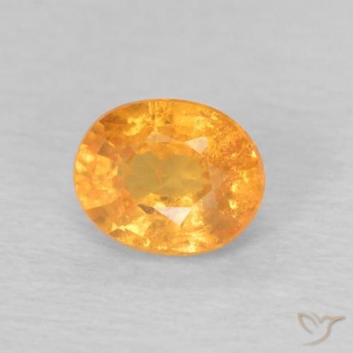 Grenat Spessartite Orange intense naturelle ovale, 0.62 ct, VS