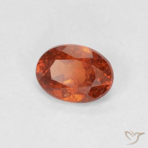 Grenat Spessartite Orange rougeâtre naturelle ovale, 0.64 ct, SI