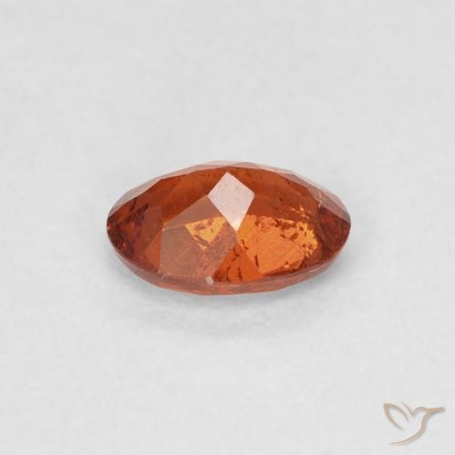 Grenat Spessartite Orange rougeâtre naturelle ovale, 0.64 ct, SI