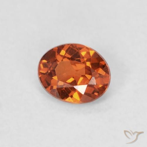 Grenat Spessartite Orange rougeâtre naturelle ovale, 0.36 ct, VS