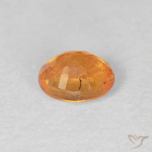 Grenat Spessartite Orange intense naturelle ovale, 0.56 ct, VS