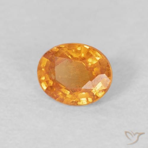 Grenat Spessartite Abricot orange naturelle ovale, 0.41 ct, VS