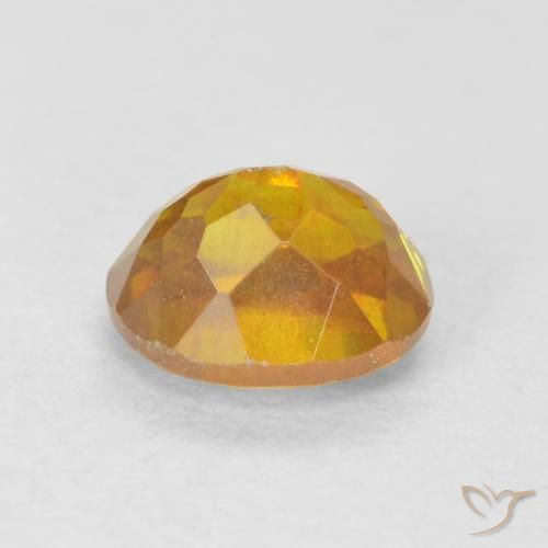 Sphalérite Doré-orange foncé naturelle ovale, 0.91 ct, VS-SI