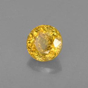 Sphène jaune naturelle coupe roude, 0,64 ct, VS