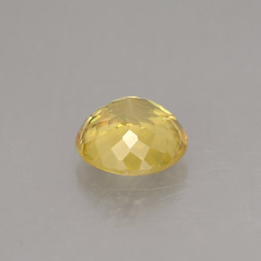 Sphène jaune naturelle coupe roude, 0,73 ct, VS