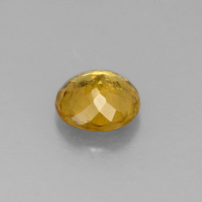 Sphène jaune naturelle coupe roude, 0,69 ct, VS-SI