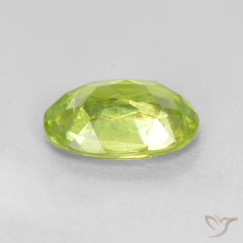 Sphène Vert jaunâtre vif naturelle ovale, 0.98 ct, VS-SI