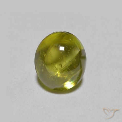 Sphène Vert jaunâtre naturelle ovale, 1.39 ct, Transparent
