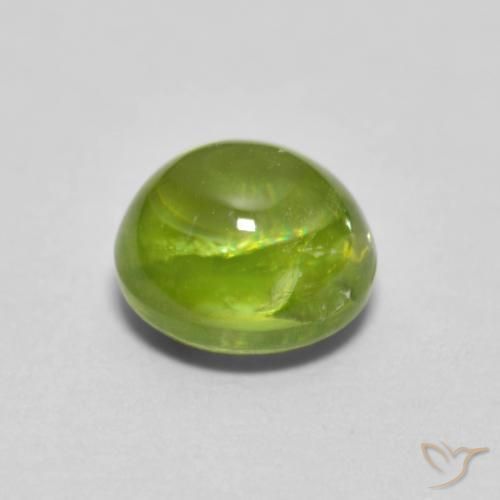 Sphène Vert jaunâtre naturelle ovale, 1.09 ct, Transparent