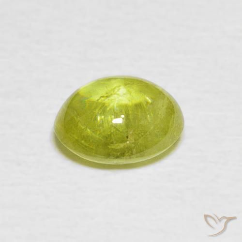 Sphène Jaune verdâtre clair naturelle ovale, 1.38 ct, Transparent