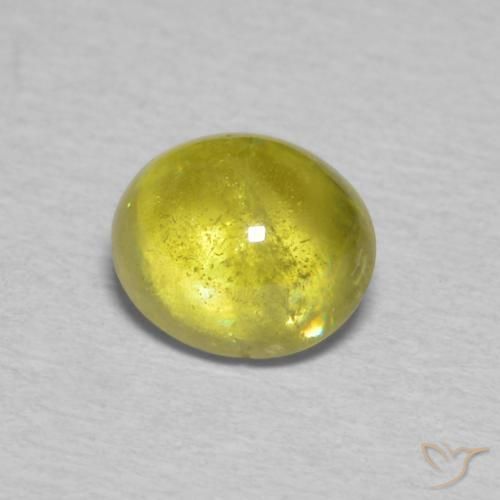 Sphène Vert jaunâtre naturelle ovale, 1.53 ct, Transparent