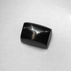 Diopside étoilé noir naturelle baguette, 1,89 ct, opaque