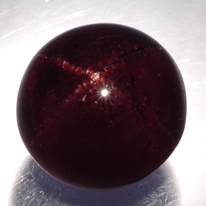 Grenat étoilé noir naturelle coupe roude, 10,82 ct, opaque