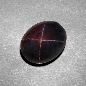 Grenat étoilé noir naturelle coupe ovale, 8,98 ct, opaque