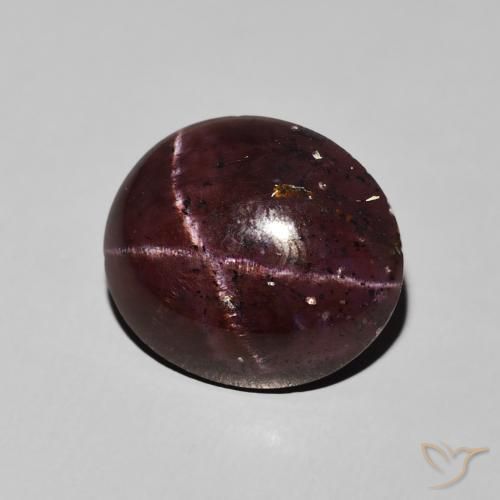 Grenat étoilé Rouge acajou naturelle ovale, 11.81 ct, Opaque