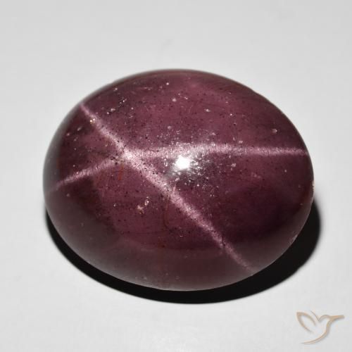 Grenat étoilé Rouge acajou naturelle ovale, 64.50 ct, Opaque