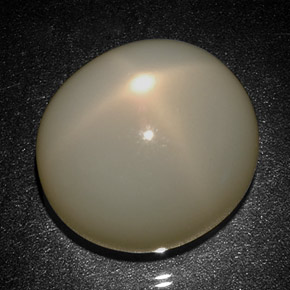 Pierre de lune étoilée crème naturelle coupe ovale, 31,27 ct, translucide