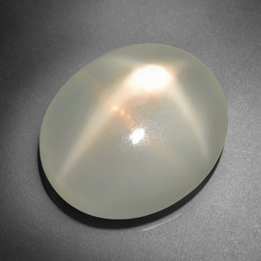Pierre de lune étoilée crème naturelle coupe ovale, 20,82 ct, translucide