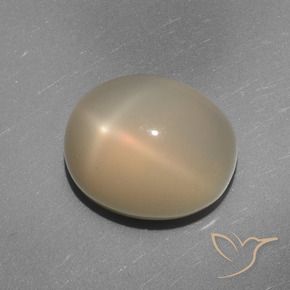 Pierre de lune étoilée Orange moyen-léger naturelle ovale, 7.02 ct, Translucide