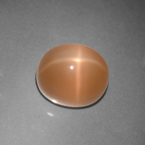 Pierre de lune étoilée orange naturelle coupe ovale, 5,07 ct, translucide