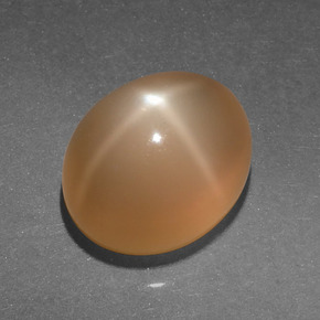 Pierre de lune étoilée orange naturelle coupe ovale, 4,95 ct, translucide