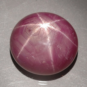 Rubis étoilé rouge naturelle coupe ovale, 31,54 ct, opaque