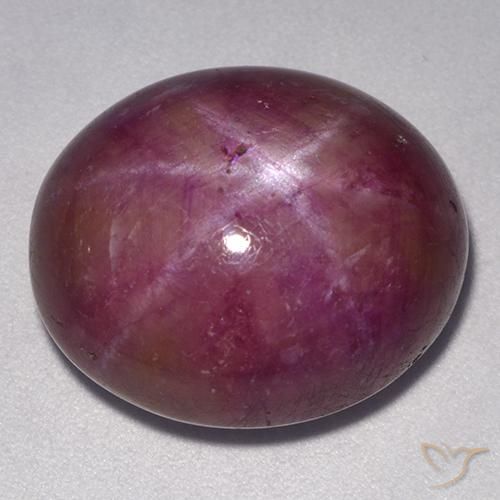 24.55ct Naturel Violet rougeâtre Rubis étoilé, ovale, Opaque