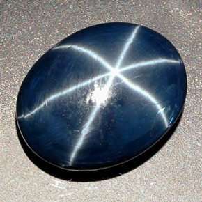 Saphir étoilé bleue naturelle coupe ovale, 27,48 ct, opaque
