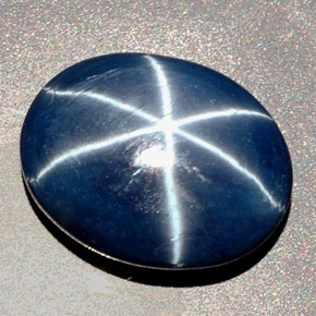 Saphir étoilé bleue naturelle coupe ovale, 27,48 ct, opaque