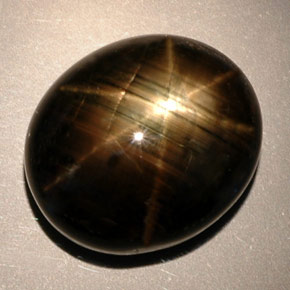 Saphir étoilé noir naturelle coupe ovale, 24,91 ct, opaque