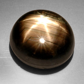 Saphir étoilé noir naturelle coupe ovale, 22,55 ct, opaque